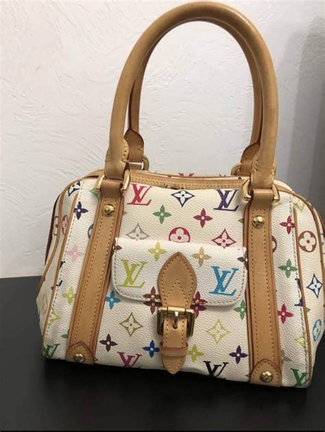 fake rainbow color louis vuitton bag with seam on bottom|louis vuitton hologram bag.